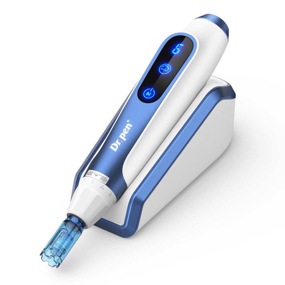 Dr. Pen A11 device on its blue and white induction stand